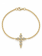 Bezel Crystal Gold Cross Bracelet with sparkling crystal cross centerpiece on a white background, delicate Christian faith jewelry design.