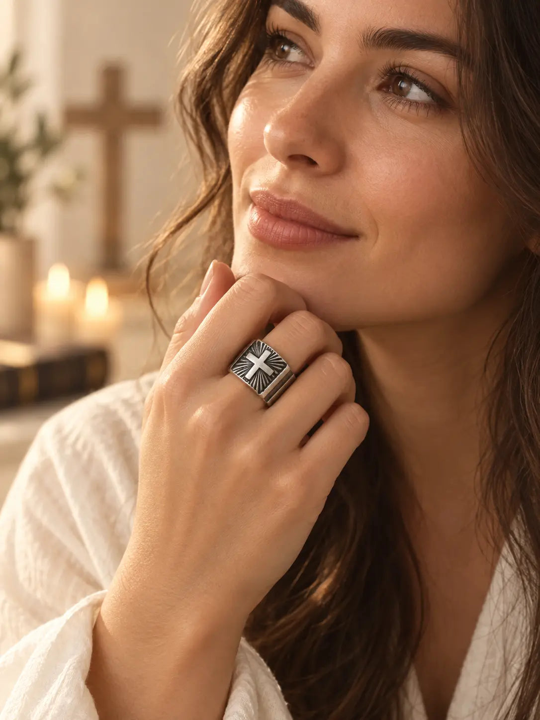 Woman wearing a Yeneast vintage silver-tone Christian cross signet ring with a bold engraved design.
