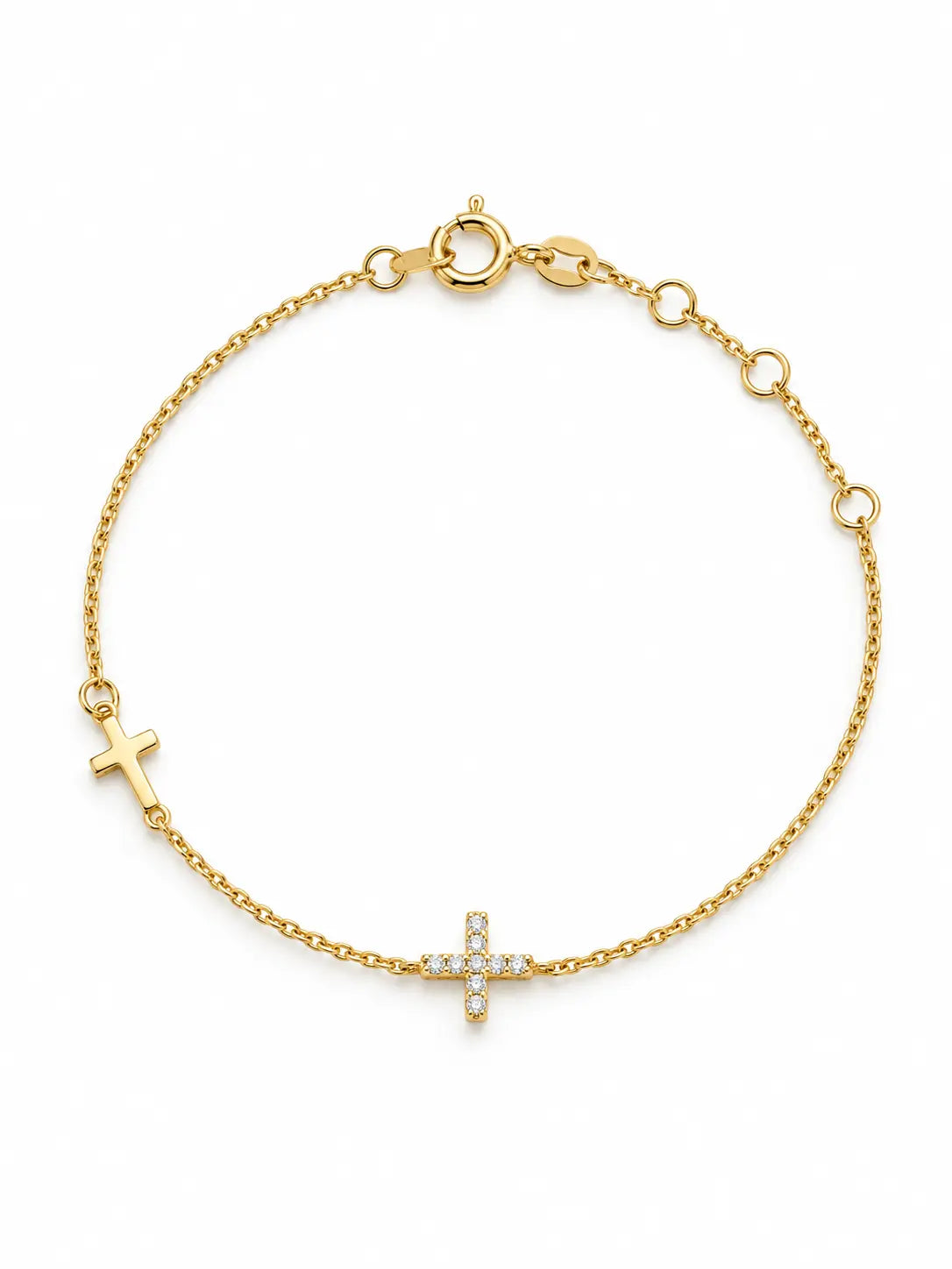 Dainty Gold Dual Cross Charm Bracelet on a white background, featuring one polished gold cross and one crystal cross on a delicate chain.