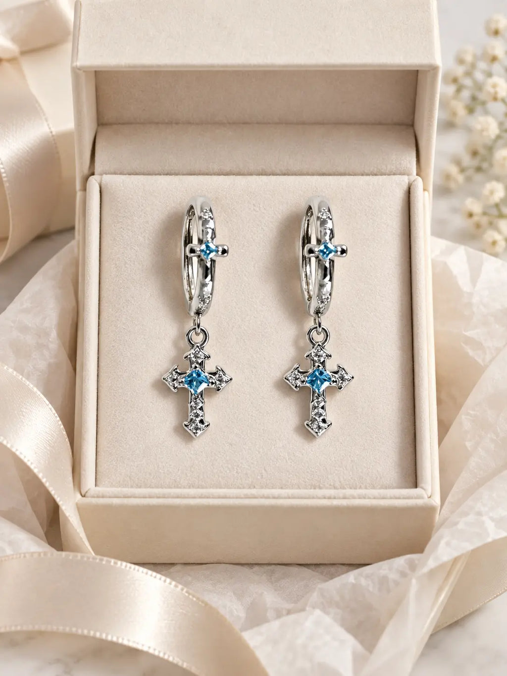 YENEAST blue sapphire cross hoop earrings presented in an elegant jewelry gift box for a meaningful Christian faith gift.