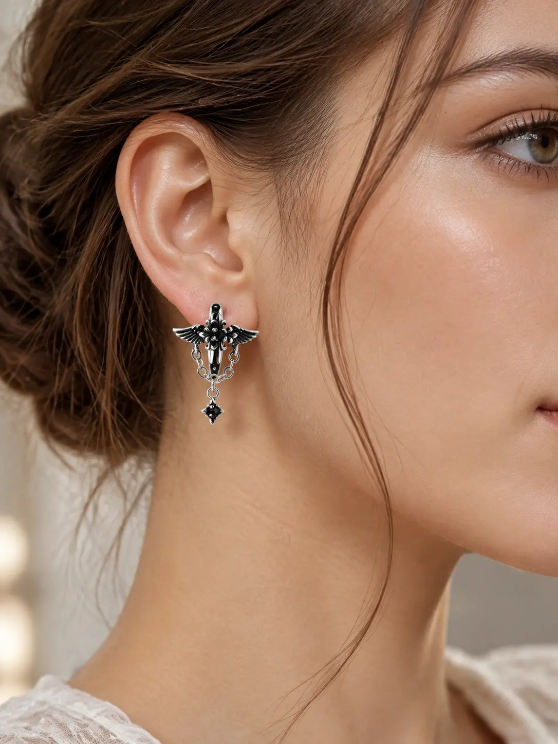 YENEAST gothic angel wing earrings worn as unique faith inspired jewelry with silver wing details and dangling gemstone charms.