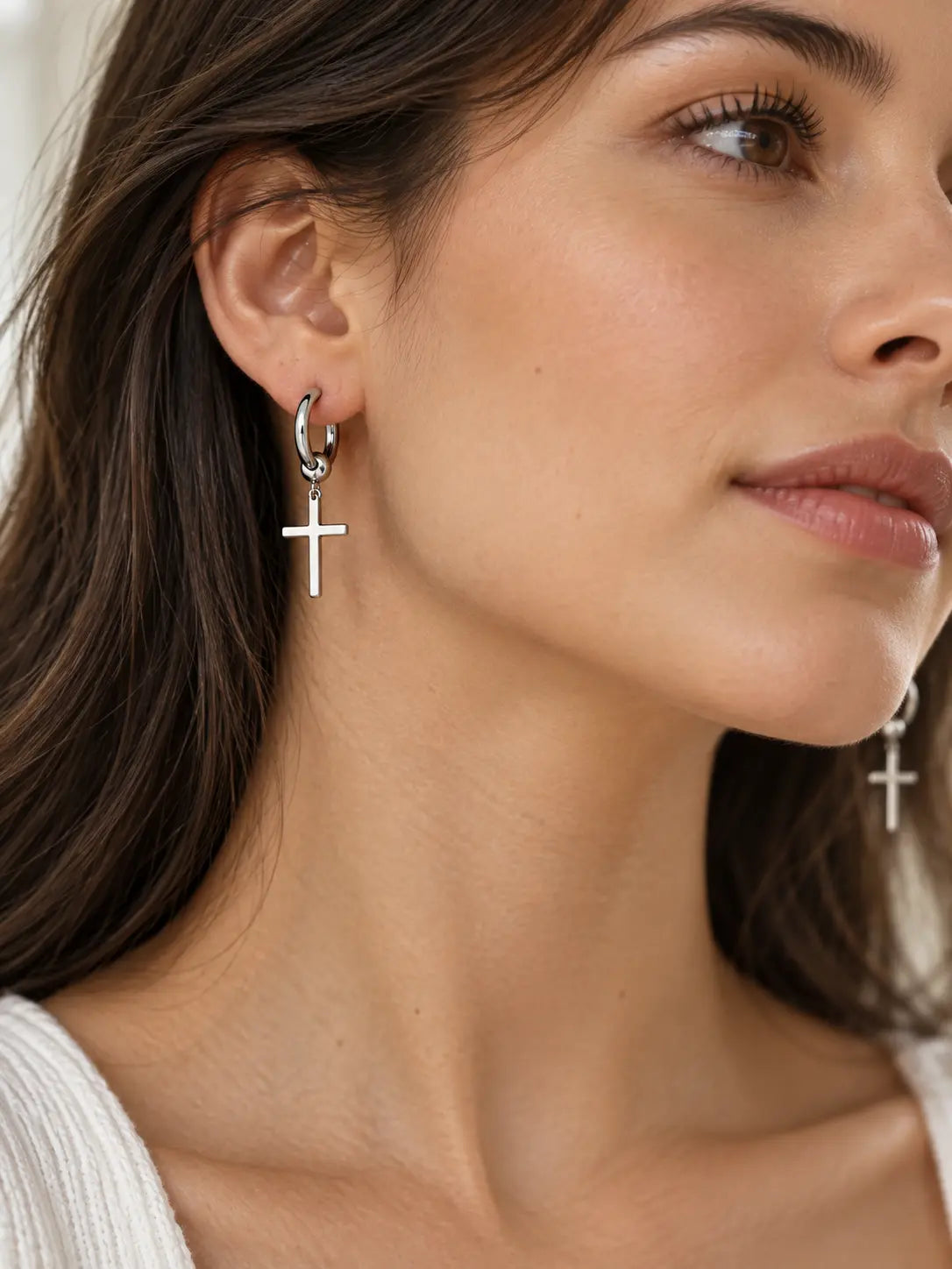 YENEAST silver cross hoop earrings worn as elegant Christian faith jewelry with minimalist cross pendants.