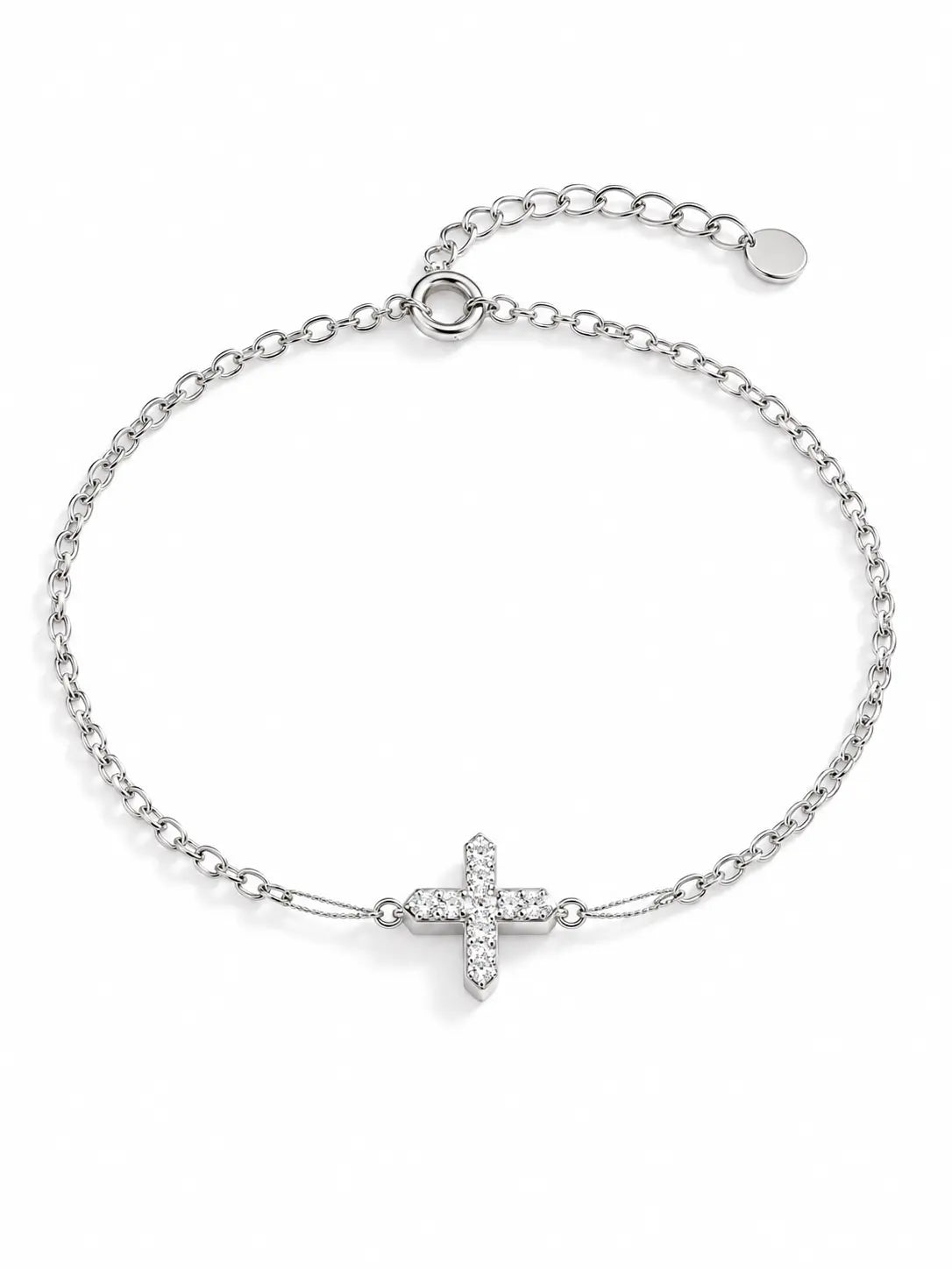 Zircon Cross Bracelet in silver on a white background, featuring a delicate chain and a sparkling crystal cross centerpiece.